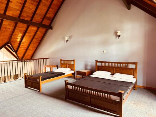 Cama o camas de una habitación en The Ranmin Lodge