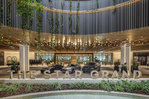 a rendering of the grand grand lobby of the grand grandstand at The Star Grand Brisbane in Brisbane