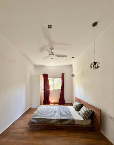 Ένα ή περισσότερα κρεβάτια σε δωμάτιο στο Villa Soafeno