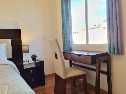Letto o letti in una camera di Habitación con baño privado, cerca del Parque Toluca 2000, con áreas comunes compartidas