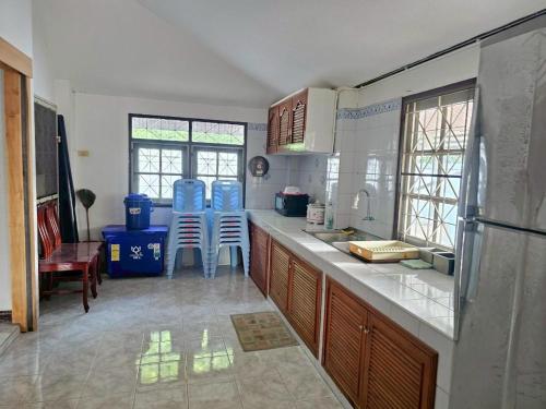Η κουζίνα ή μικρή κουζίνα στο Coastal Haven Homestay