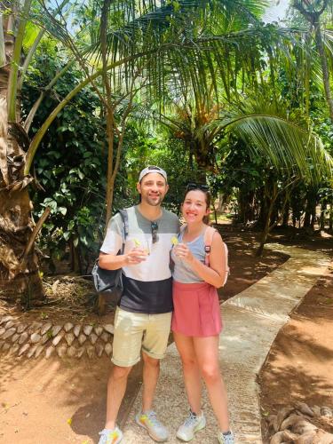 a man and a woman posing for a picture at Udawalawa Eco Lodge in Udawalawe