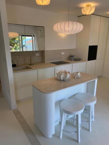 Apartment Oasis tesisinde mutfak veya mini mutfak