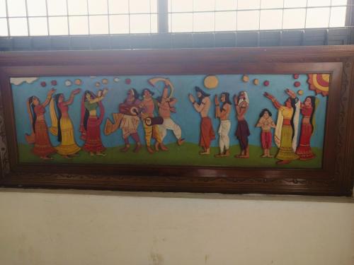 a painting of a group of women dancing at Poonthanam guest house in Guruvāyūr