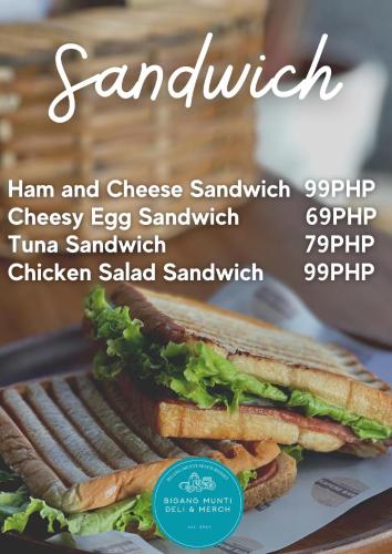 a sandwich cut in half on a plate at Sea View Cabin in Lobo in Batangas City