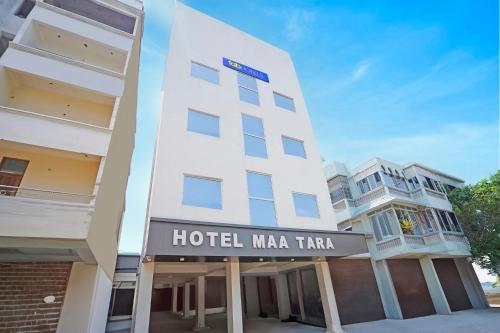 a hotel mirka tulum sign in front of a building at FabHotel Maa Tara in Patna