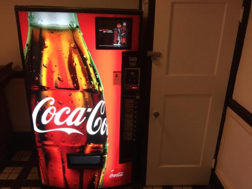 a cocacola soda vending machine with a coke bottle at Nash Hotel in Berkeley