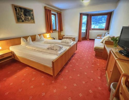Postel nebo postele na pokoji v ubytování Alpine B&B