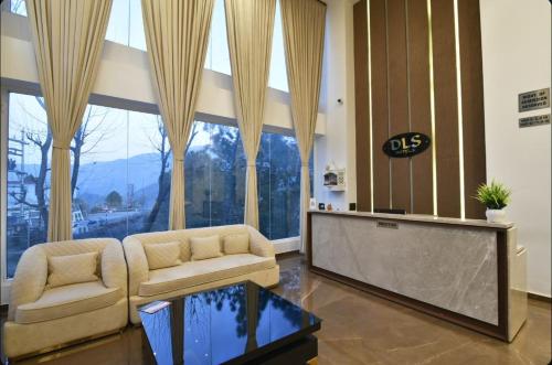 Χώρος καθιστικού στο Claret inn by Lawrence Hotels