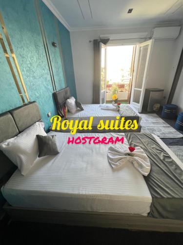 a hotel room with a large bed in a room at Garden City Suites EL Tahrir in Cairo