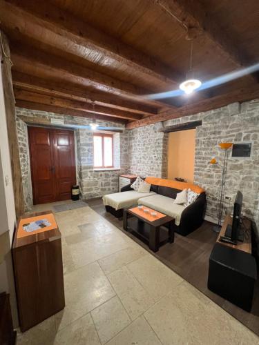Ένα ή περισσότερα κρεβάτια σε δωμάτιο στο Apartman Poli Luce