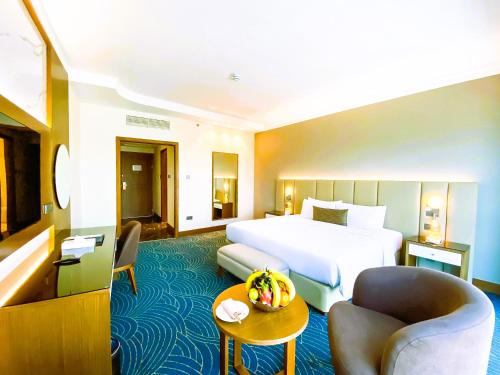 Кровать или кровати в номере City Seasons Hotel Dubai