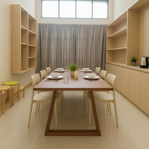 a dining room with a table and chairs at 3BR max 9pax near MRT Ratchada Good for group in Bangkok