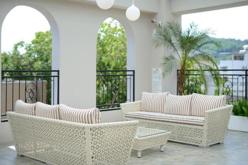 Ein Balkon oder eine Terrasse in der Unterkunft Caffir Garden Hotel