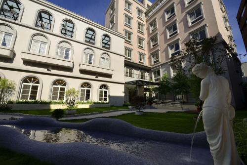 Ein Garten an der Unterkunft Caffir Garden Hotel