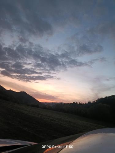 a view from a car of a field at sunset at Agriturismo la Tana in Città di Castello