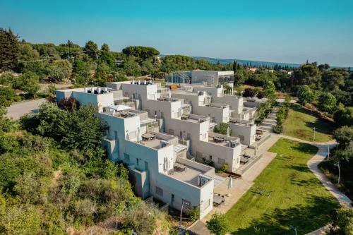 an aerial view of a white building on a hill at Keshet Eilon Galilee Views Retreat by Sea N' Rent in Elon