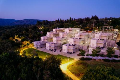 an aerial view of a large white building at night at Keshet Eilon Galilee Views Retreat by Sea N' Rent in Elon
