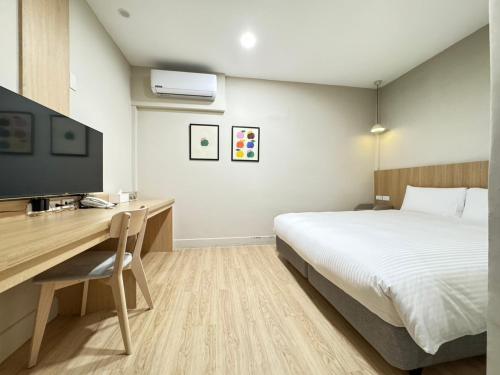 Télévision ou salle de divertissement dans l'établissement Yoshi Hotel - Tainan Sinmei Branch