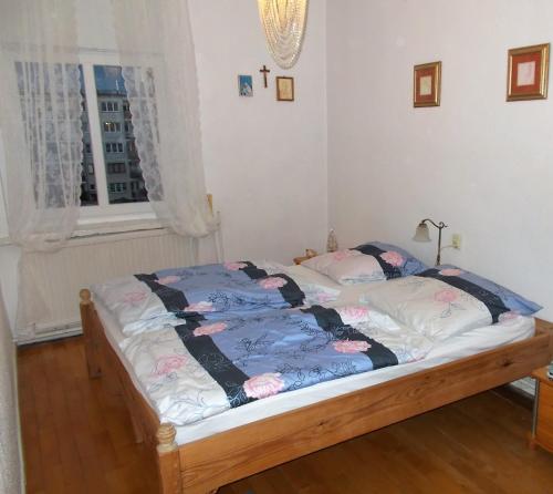 Katil atau katil-katil dalam bilik di Apartament Dworcowa