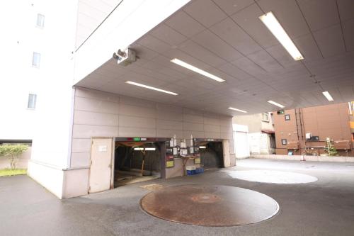 a large empty building with a large room with a large floor at Quintessa Hotel Sapporo in Sapporo