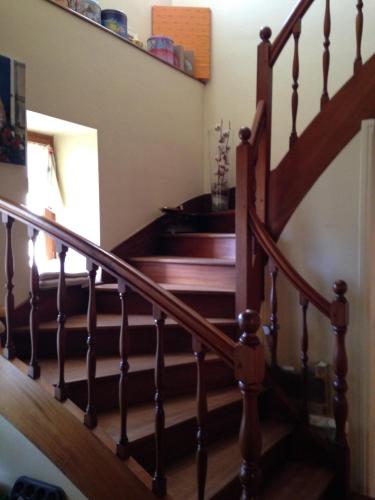 a staircase in a home with a stair case at CHEZ BEATRICE in Herbignac