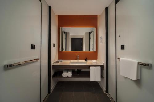 Un baño de CNHOL RADIENT HOTEL Dongguan Humen