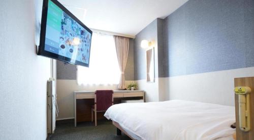Hotel Riverge Akebonoにあるテレビまたはエンターテインメントセンター