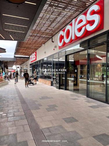 a coles store with people walking in front of it at Brand New Designer House in Marsden Park