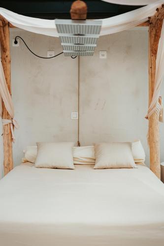 Postel nebo postele na pokoji v ubytování Sand Nest