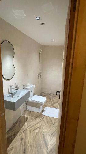 a bathroom with a sink and a toilet at Dar Charkaoui in Tetouan