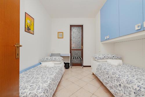 Ένα ή περισσότερα κρεβάτια σε δωμάτιο στο Casa di Shrek 110mq ristrutturato a nuovo con grande terrazzo