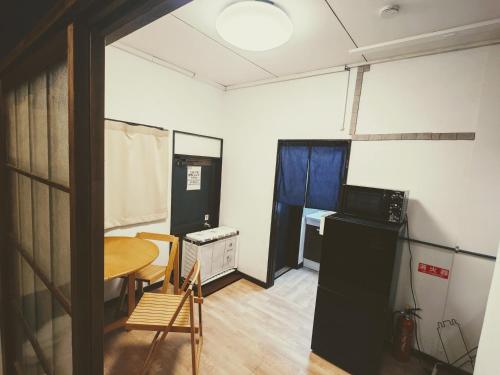 Η κουζίνα ή μικρή κουζίνα στο Japanese-Tradtional House Max 8 Guest 6-Min Walk from Station Check-out at 12 PM