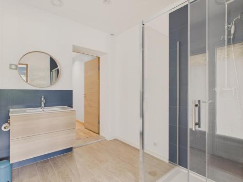a bathroom with a sink and a shower at Maison avec terrasse et jardin à la Baule pour 6 in La Baule