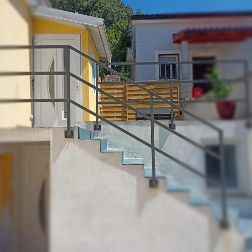 a stair railing on a balcony of a building at Pipilota in Rijeka