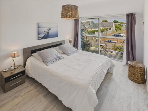 Ένα ή περισσότερα κρεβάτια σε δωμάτιο στο 200m plage - duplex pour 2 adultes, 2 enfants