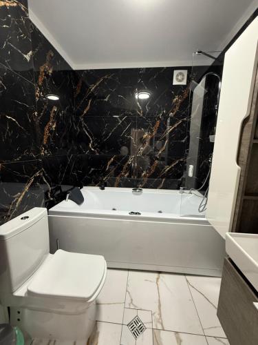 Ένα μπάνιο στο Hotel Kalyan & Spa