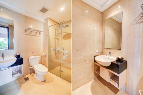a bathroom with a toilet and a sink and a shower at Palette Signature Hotel in Sanur