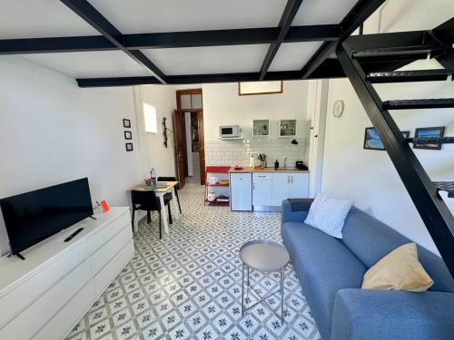 TV a/nebo společenská místnost v ubytování Studio La Palma