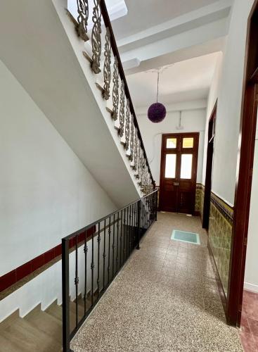 a staircase in a house with a stair railing at La Palma in Ingenio