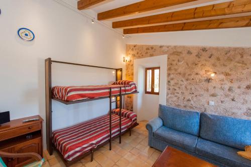 Postel nebo postele na pokoji v ubytování Finca Hotel Ses Cases Noves