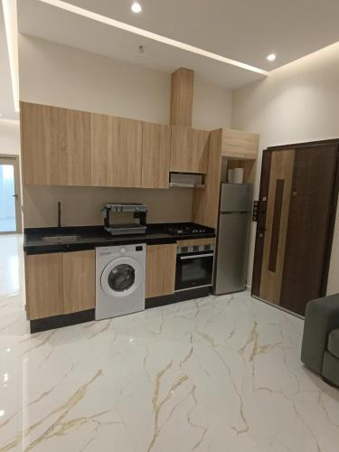 Kuchyň nebo kuchyňský kout v ubytování appartment igar azougagh elhoceima