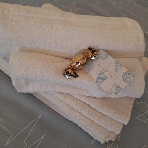 a towel with a ring on top of it at IL PORTICCIOLO in Riomaggiore