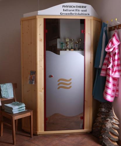 a room with a sliding door in a room at Kasperbauer in Kirchberg in Tirol