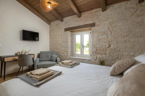 Voodi või voodid majutusasutuse Villa Lapidea by Istrialux toas