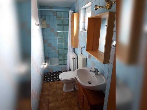 Ένα μπάνιο στο Ferienwohnung am Kurpark
