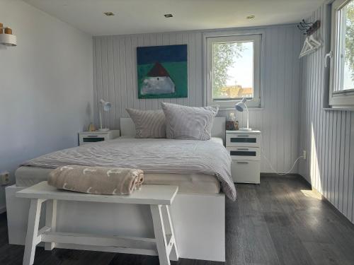 Cama o camas de una habitación en Casparhus