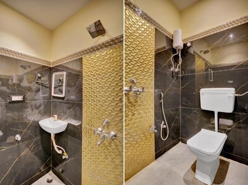 a bathroom with a toilet and a shower and a sink at Super Hotel O Golden Suites in Turambhe