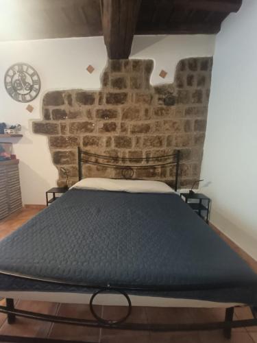 Ένα ή περισσότερα κρεβάτια σε δωμάτιο στο Bagnaia Suite