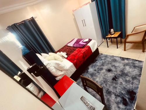 Ένα ή περισσότερα κρεβάτια σε δωμάτιο στο Forest Home Accommodation
